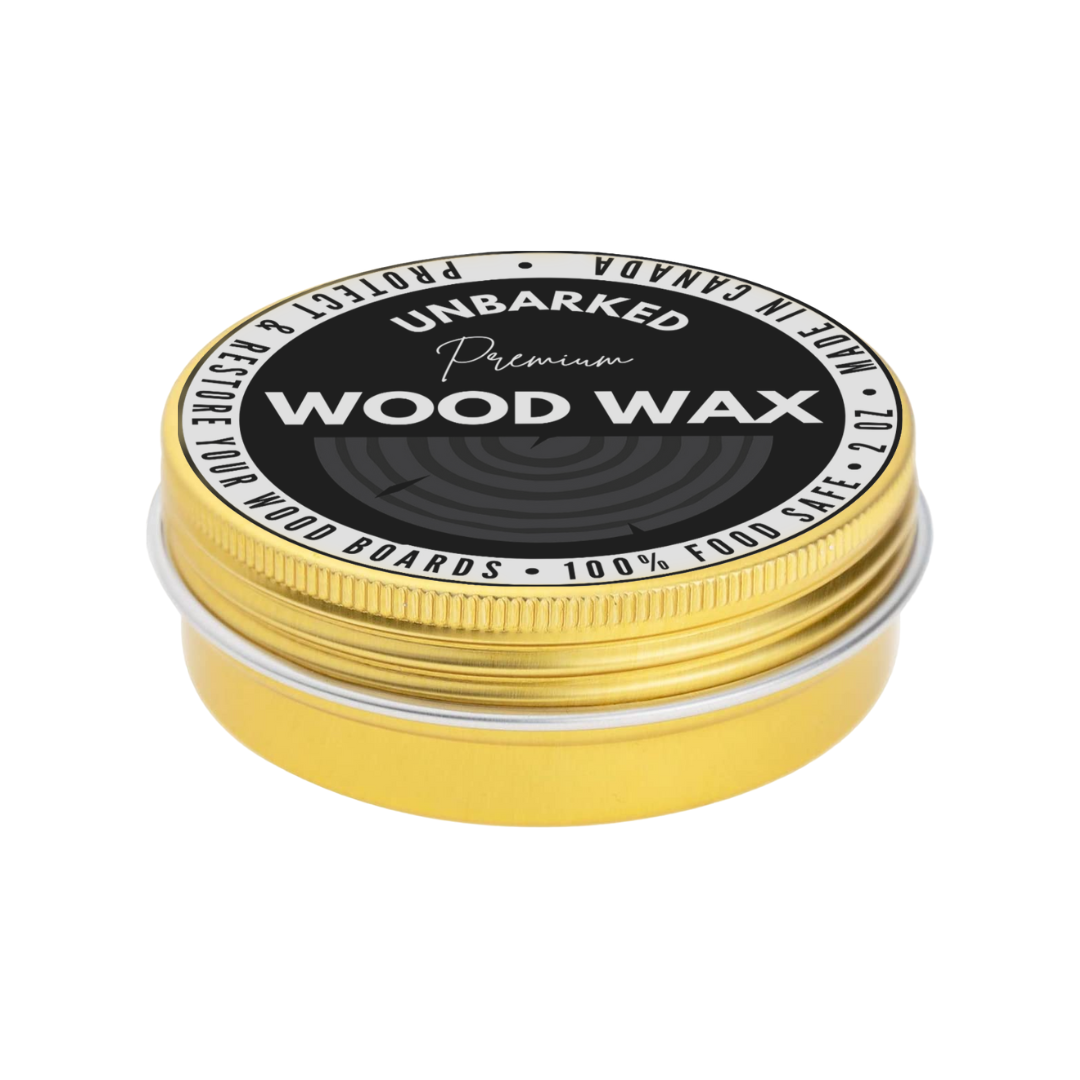 a closed gold tin with unbarked premium wood wax logo on top 