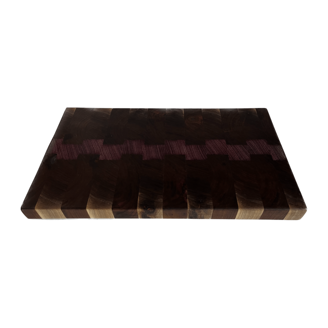 a funky looking cutting board with heartwood and sapwood stripes along the edges, darker towards the middle, and purpleheart brick-laying pattern through the middle